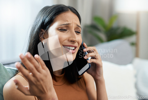 Image of Stress, phone call and woman on sofa frustrated with network, fail or phishing scam at home. Anxiety, face and angry female person in a living room with smartphone, conversation and conflict disaster