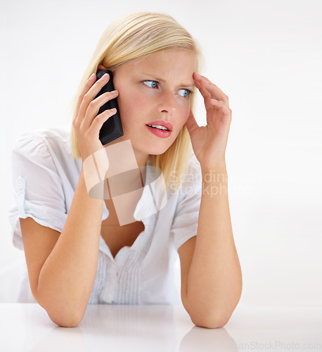 Image of Young woman, phone call and stress, confused or worried for bad news, bankruptcy or home debt. Person listening on mobile and thinking of budget mistake or wrong decision on wall or white background