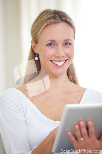 Image of Mature woman, tablet and smiling in home, happy face and living room couch. Social media, technology and communication for scrolling, vision and online with connection, streaming and digital