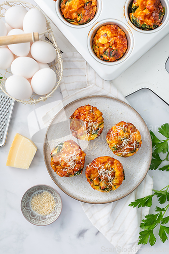 Image of Homemade healthy spinach and cheese egg muffins, high protein and low carb breakfast