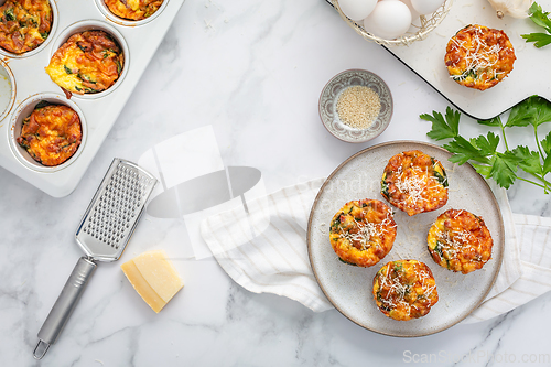 Image of Homemade healthy spinach and cheese egg muffins, high protein and low carb breakfast