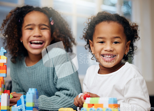 Image of Laughing, children and playing with education, happy and smile from comedy and development. Toys, sibling and funny joke with sister love, youth care and support together with blocks for knowledge