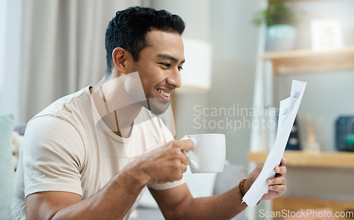 Image of Home, bills and happy man with coffee for planning, reading financial documents and taxes management in living room. Young person with tea and paperwork for mortgage, budget and insurance or finance