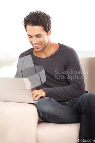 Image of Happy man, work from home and laptop for marketing, copywriting and planning or research on website and sofa. Startup freelancer or blog writer relax on couch with computer, internet or happy project