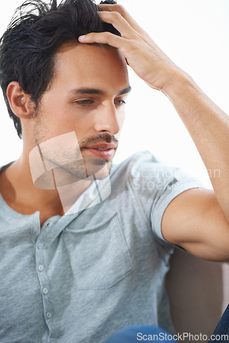 Image of Thinking, depression and man with stress, anxiety and regret mistake in home living room. Serious, frustrated person and financial crisis, challenge and reflection on decision, fail and mental health