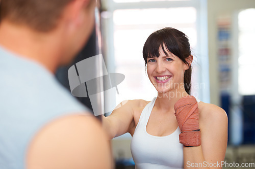 Image of Happy woman, portrait and boxing with personal trainer for self defense, workout or exercise at gym. Face of female person or boxer smile for MMA, fighting or indoor training in martial arts practice
