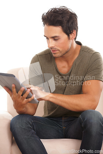 Image of Search, relax and tablet with man on sofa for online, social media and connection. Streaming, digital and technology with person in living room at home for networking, communication and contact