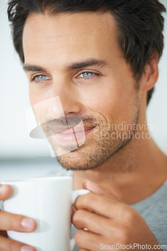 Image of Relax, face and happy man with coffee break in a house with me time, peace or weekend freedom at home. Smile, chilling and male person with tea in a. living room for a calm moment of reflection