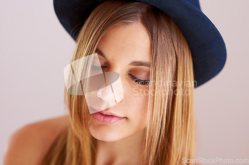 Image of Woman, eyes closed and hat for fashion in studio with mock up for style on white background. Swedish model, hairstyle and confidence by satisfaction on face with vintage, clothes and fedora in space