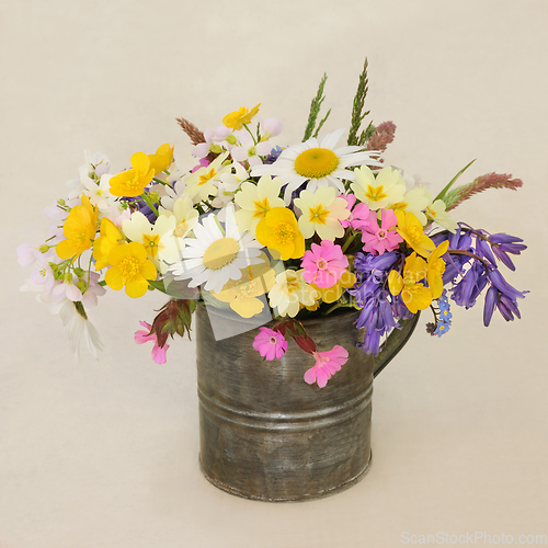 Image of Spring Wildflower Aarrangement in an Old Metal Tin Vase