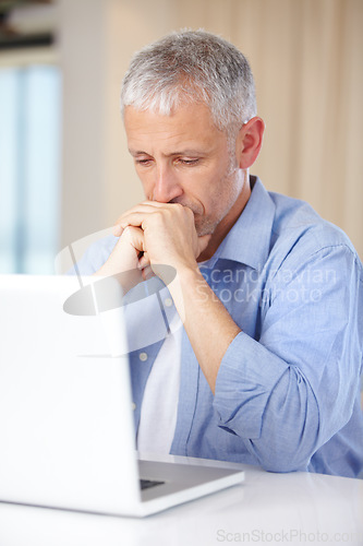 Image of Mature man, laptop and thinking or stress, burnout and anxiety for challenge on technology. Male person, internet and question or doubt for information, brainstorming and online research or planning