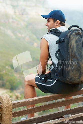 Image of Fitness, happy man and rest of nature hiking with backpack for workout, training and exercise view. Hiker, person and smile on relax mountains for health, wellness and sports for Brazil summer break