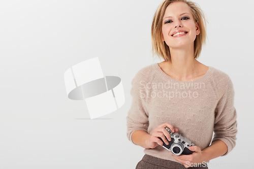 Image of Portrait, happy woman and camera for photography in studio with mock up on white background. Swedish model, hand and smiling with lens for equipment in creative career, picture or memory in space
