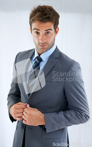 Image of Portrait, suit and business with man, employee and confidence with startup, consultant and lawyer. Worker with legal practice, agent or entrepreneur with professional, corporate or career with blazer
