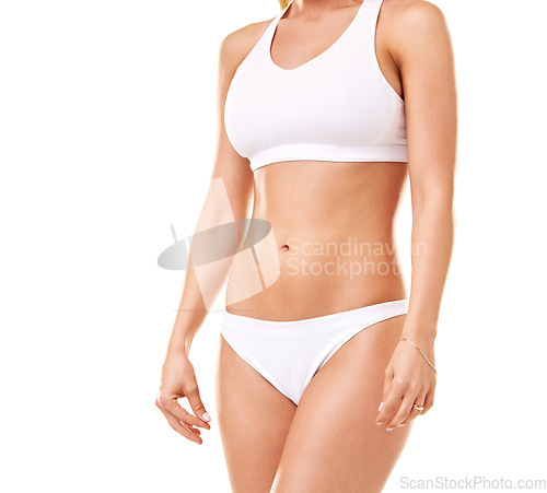 Image of Wellness, health and body of woman in underwear for cosmetics, skincare and diet in studio. Fitness, stomach and isolated person in lingerie for workout, lose weight and beauty on white background