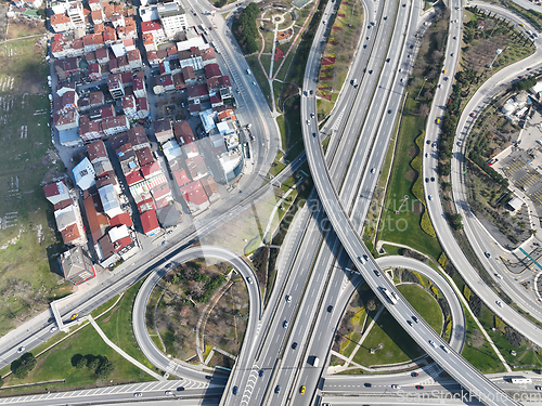 Image of Aerial View Modern Multilevel Motorway Junction with Toll Highway, Road traffic an important infrastructure Transportation and travel concept