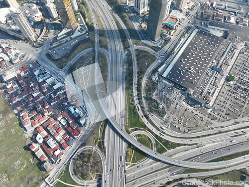 Image of Aerial View Modern Multilevel Motorway Junction with Toll Highway, Road traffic an important infrastructure Transportation and travel concept