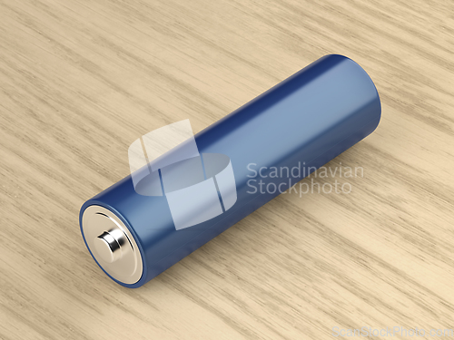 Image of Battery on wood table
