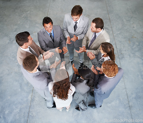 Image of Circle, applause or professional people celebrate, praise or congratulations for success, achievement or promotion. Motivation, top view group or teamwork celebration, clapping or winner announcement