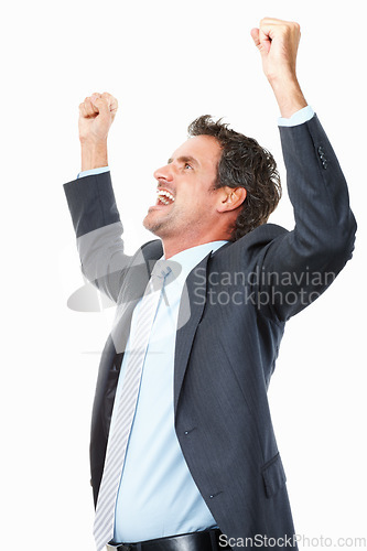 Image of Business man, winner and yes in studio for celebration, achievement or winning of bonus, sales or profit. Excited corporate worker with fist, success and freedom for opportunity on a white background