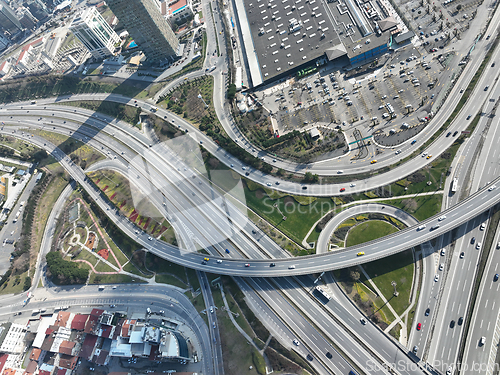 Image of Aerial View Modern Multilevel Motorway Junction with Toll Highway, Road traffic an important infrastructure Transportation and travel concept