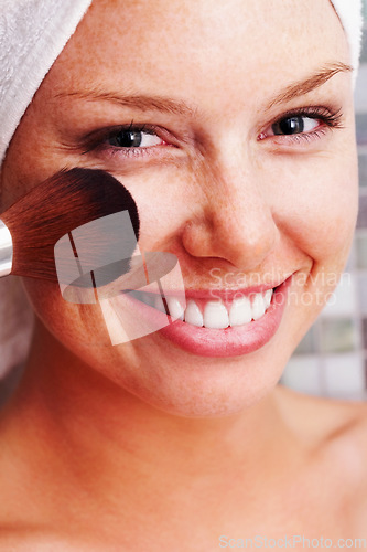 Image of Happy, portrait and woman with makeup, brush or results in bathroom closeup for wellness. Smile, face and female person with beauty, tools or foundation, cosmetics or powder application for grooming