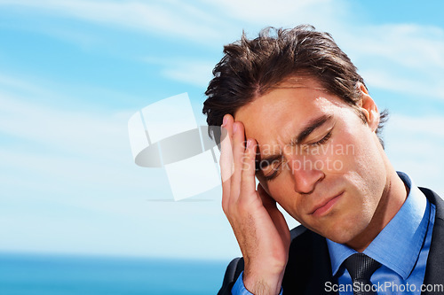 Image of Headache, sky and face of business man sad, tired or stress over corporate mistake, company disaster or agency fail. Mockup space, migraine pain and closeup professional person depressed over crisis