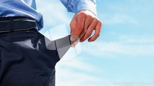 Image of Hand of businessman, empty pocket and blue sky with mockup, trading crisis and bankruptcy. Debt, poverty and money problem, broke investor man with stock market crash and poor financial management.