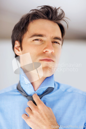 Image of Business, change and portrait of man and tie in home for morning routine, dressing and ready. Fashion, professional and career with face of person and shirt for confidence, start and preparation