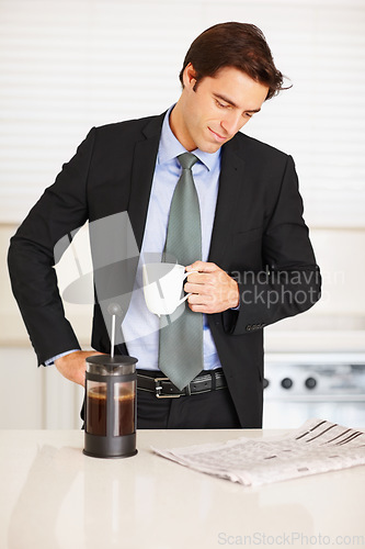 Image of Business man, reading newspaper and coffee in kitchen with thinking, ideas or check stats on global market. Trader, investor and morning paper for announcement, stock and decision for financial job