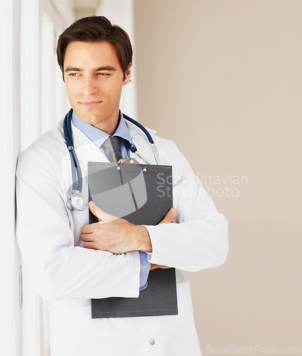 Image of Man, doctor and thinking by window at hospital with clipboard for prescription, research or medical historyl. Male person or surgeon in wonder for diagnosis, appointment or life insurance at clinic