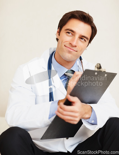 Image of Clipboard, thinking doctor and happy man writing medical report plan, hospital information or medicine notes. Brainstorming cardiology ideas, checklist and expert planning clinic healthcare paperwork