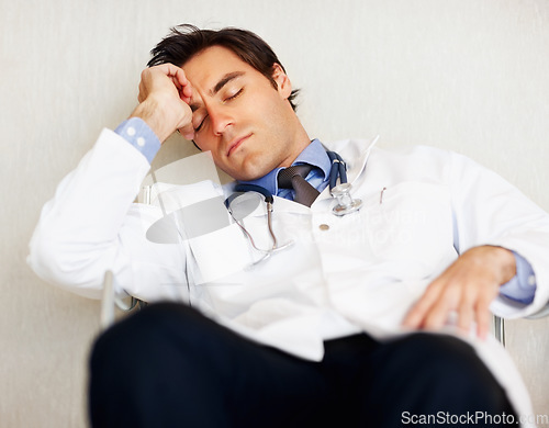 Image of Burnout, tired doctor and sleeping man, health expert or exhausted surgeon dream, rest or nap after cardiology services. Eyes closed, relax medical GP and nurse fatigue in clinic healthcare hospital