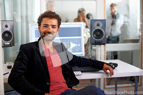 Image of DJ, happy musician and recording studio portrait with a man and music producer with tech and computer. Engineer, audio technician and media with a professional in sound booth with synthesizer