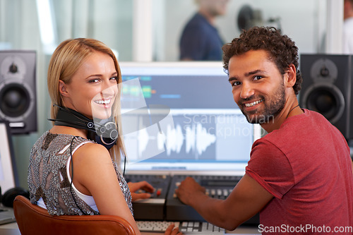 Image of Man, woman and audio engineer with computer, portrait and headphones in recording studio for music. Musician, artist and producer with sound tech for wave analysis, smile and mixer with creativity