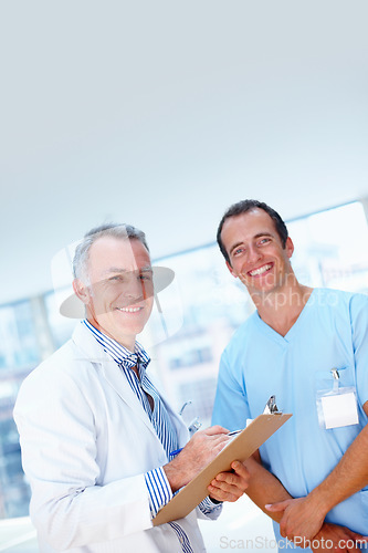 Image of Portrait, doctor and nurse with healthcare, clipboard and smile with teamwork, results and cooperation. Face, medical or professional with documents, collaboration or wellness with hospital or happy