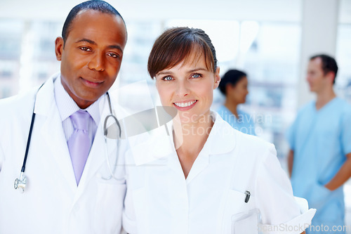 Image of Portrait, teamwork and doctor with wellness, nurse and career with leadership, clinic and medicare. Face, people and group with medical, professional and uniform in a hospital, smile and healthcare