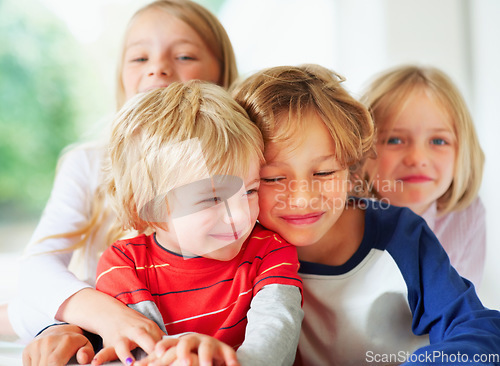 Image of Family, brothers or sisters for hug together for love, relax wellness and happiness with sibling support in home. Boys, girl and smile face for fun games in happy, bonding or care in morning in house