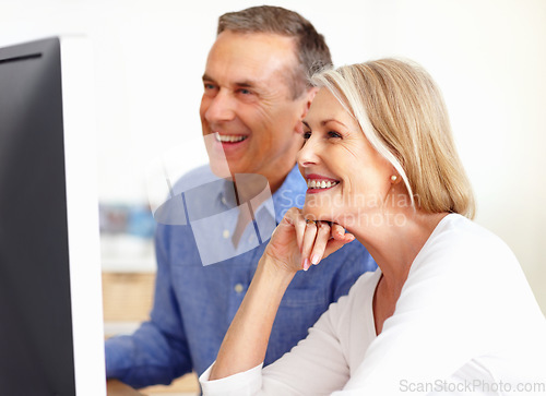 Image of Search, senior or happy couple on computer for email, social media or streaming subscription in home. Smile, booking holiday vacation online or mature people on a website or internet in living room