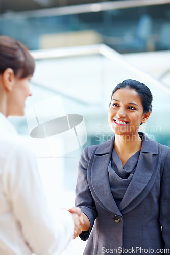 Image of Business women, handshake and introduction to job interview, Human Resources meeting or welcome for hiring. Professional people or clients shaking hands for recruitment, career success or opportunity