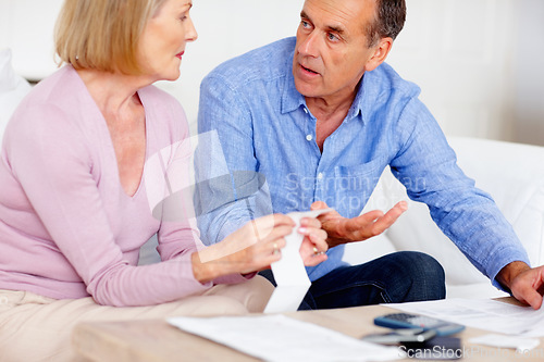 Image of Receipt, debt or senior couple with computer in home for retirement savings or pension planning. Profit growth, financial investment or mature man talking to a woman for house bills, taxes or budget