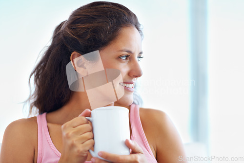 Image of Thinking, smile and woman drinking coffee in home, espresso or latte for breakfast to relax in living room in the morning. Dream, tea cup and happy person or girl with healthy beverage in apartment