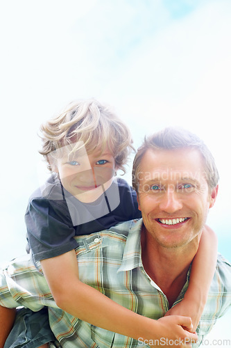 Image of Father, son and portrait outdoor with piggyback for bonding, relationship and freedom with blue sky or happy. Family, man and boy child with playing, care and love for excitement, peace and support