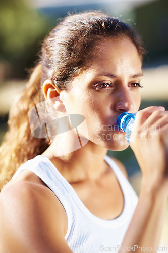 Image of Fitness, drinking water and woman outdoor for running, wellness or training in park closeup. Sports, liquid and face female runner outside for exercise, workout or morning, cardio or run in nature