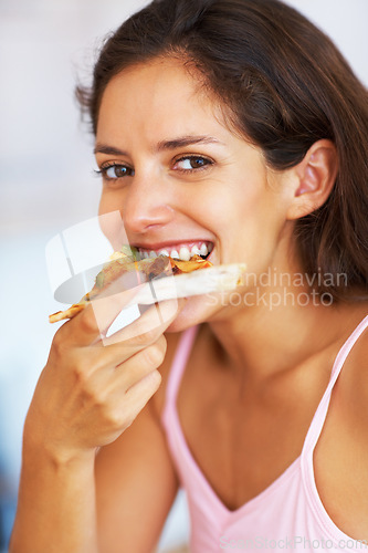 Image of Pizza, eating and portrait of young woman for dinner, lunch or supper with positive attitude. Happy, smile and female person from Canada enjoying yummy fast food in her modern home or apartment.