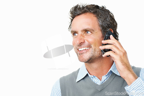 Image of Smile, phone call and mature businessman in studio for corporate communication or discussion. Happy, technology and professional male person on mobile conversation with cellphone by white background.