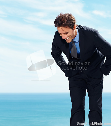 Image of Business man laughing at ocean holiday, vacation and summer travel on sky mockup space. Funny professional lawyer in suit at sea, happy and excited by water at beach outdoor for freedom in Cancun