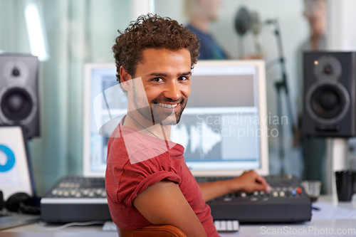 Image of DJ, radio technician and recording studio portrait with a man and music producer with tech and computer. Sound engineer, audio and media editor with a professional in musician booth with synthesizer
