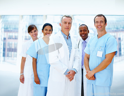 Image of Portrait, smile and doctor with healthcare, nurse and career with happiness, clinic and diversity. Face, people and group with medical, professional or about us in a hospital, cooperation or wellness