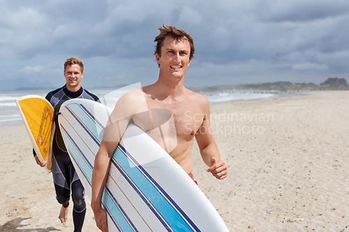 Image of Surfer men, running and friends at beach with smile, training and fitness on vacation in summer. Exercise, people and surfboard for wellness, health and happy by ocean, waves and freedom on holiday